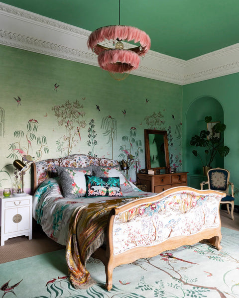  tiered feather chandelier. Wendy Morrison's bedroom with a pink feather chandelier over the chinoiserie bed