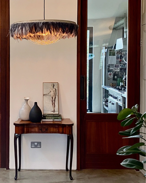 Grey feather light shade in hallway. Hallway lighting. Grey feather lampshade