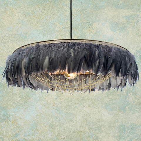 grey feather lightshade. Grey feather lamp shade with brass chains beneath. . Feather lighting